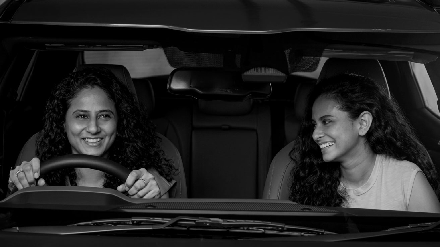 Prachi and Shailey, designmill founders, on a drive